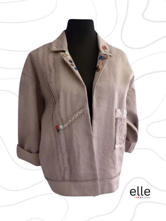 Beige Jacket with different colour buttons.